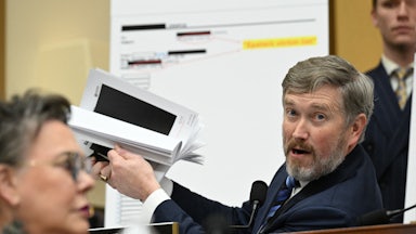Massie in a House hearing holds up redacted documents