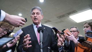 West Virginia Senator Joe Manchin speaks to reporters at the U.S. Capitol