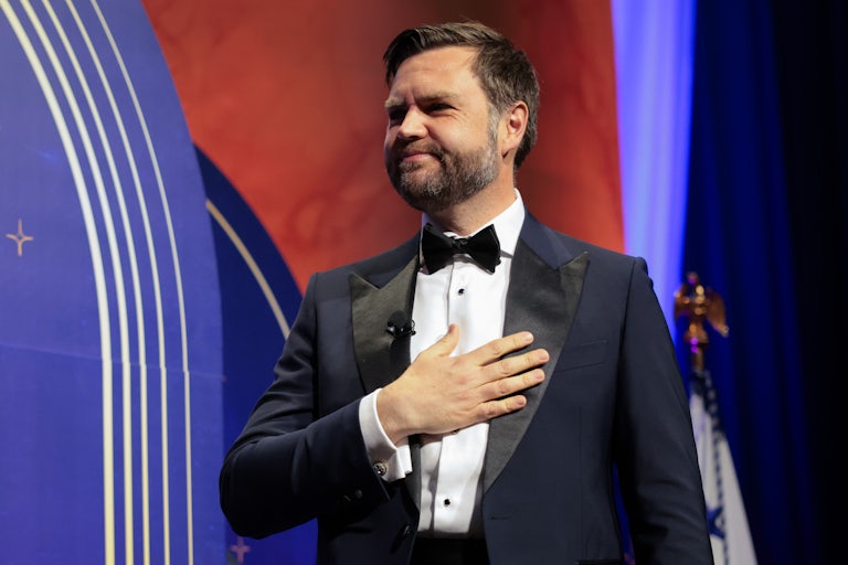 JD Vance wearing a tux with his hand over his heart