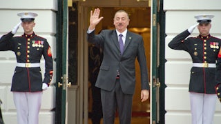 Azeri president Ilham Aliyev waves as he exits the White House in 2016.