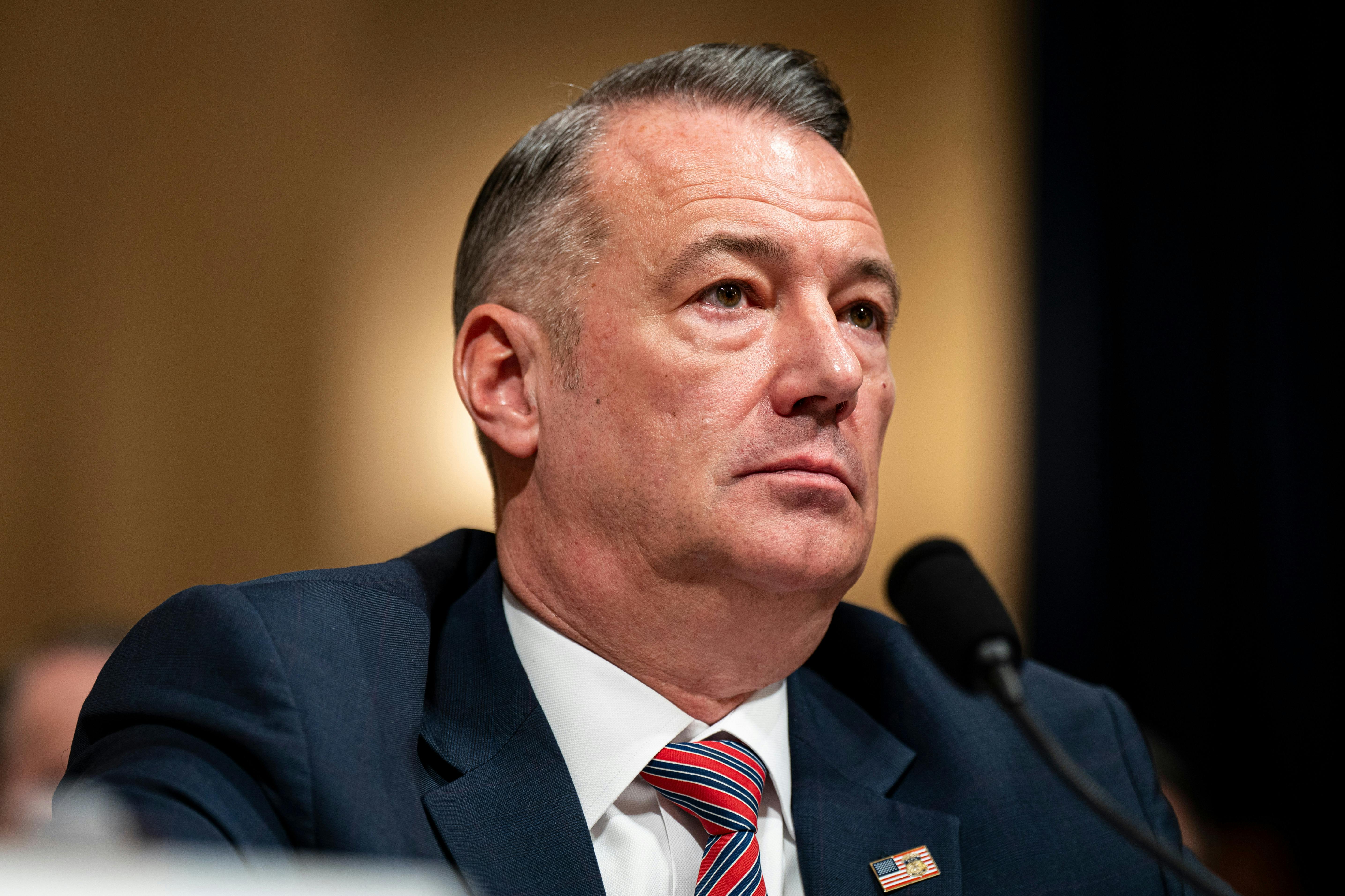 Acting ICE Director Todd Lyons sits in a House committee hearing