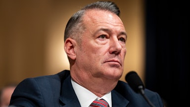 Acting ICE Director Todd Lyons sits in a House committee hearing