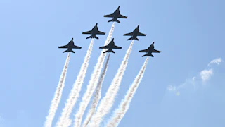 The Navy Blue Angels perform a flyover on July 4