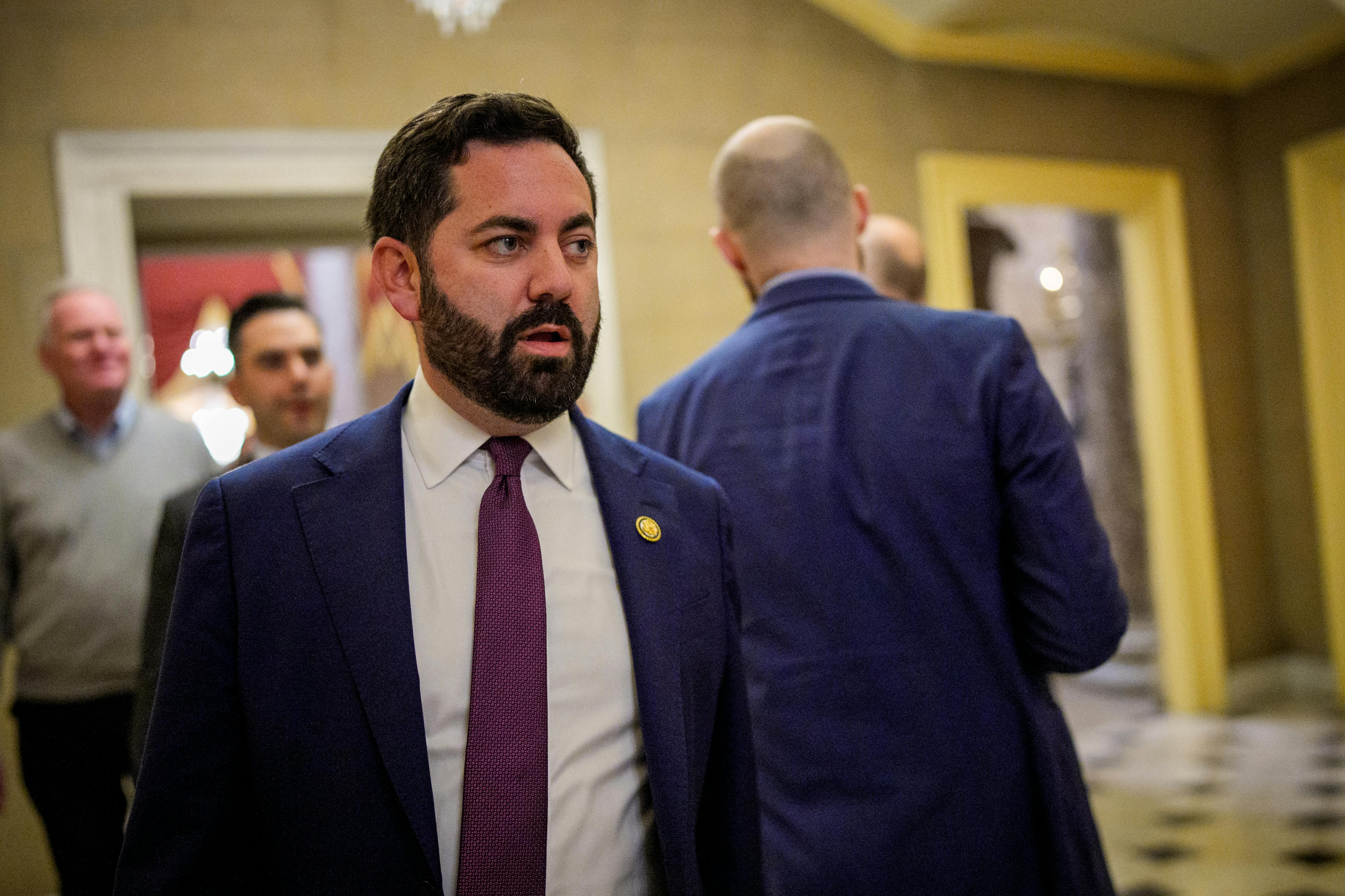 Representative Mike Lawler walks in the Capitol