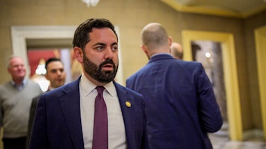 Representative Mike Lawler walks in the Capitol