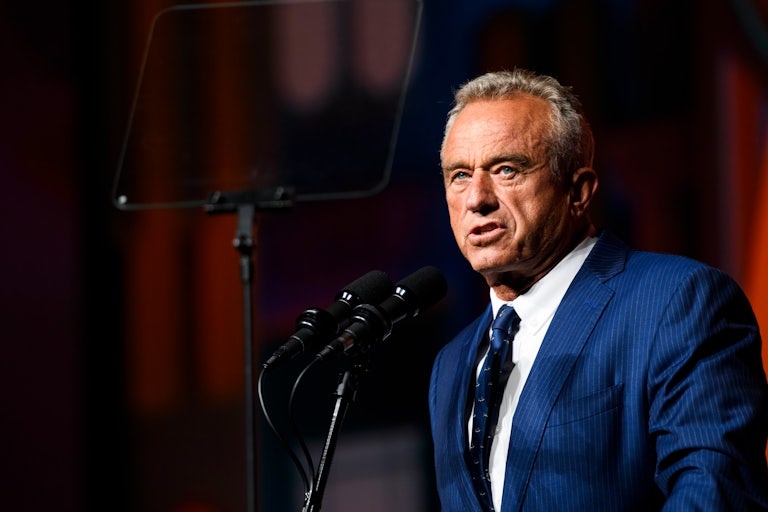 Robert F. Kennedy Jr. speaks into a microphone