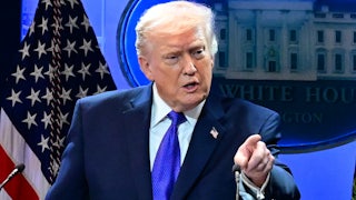 Donald Trump points a finger