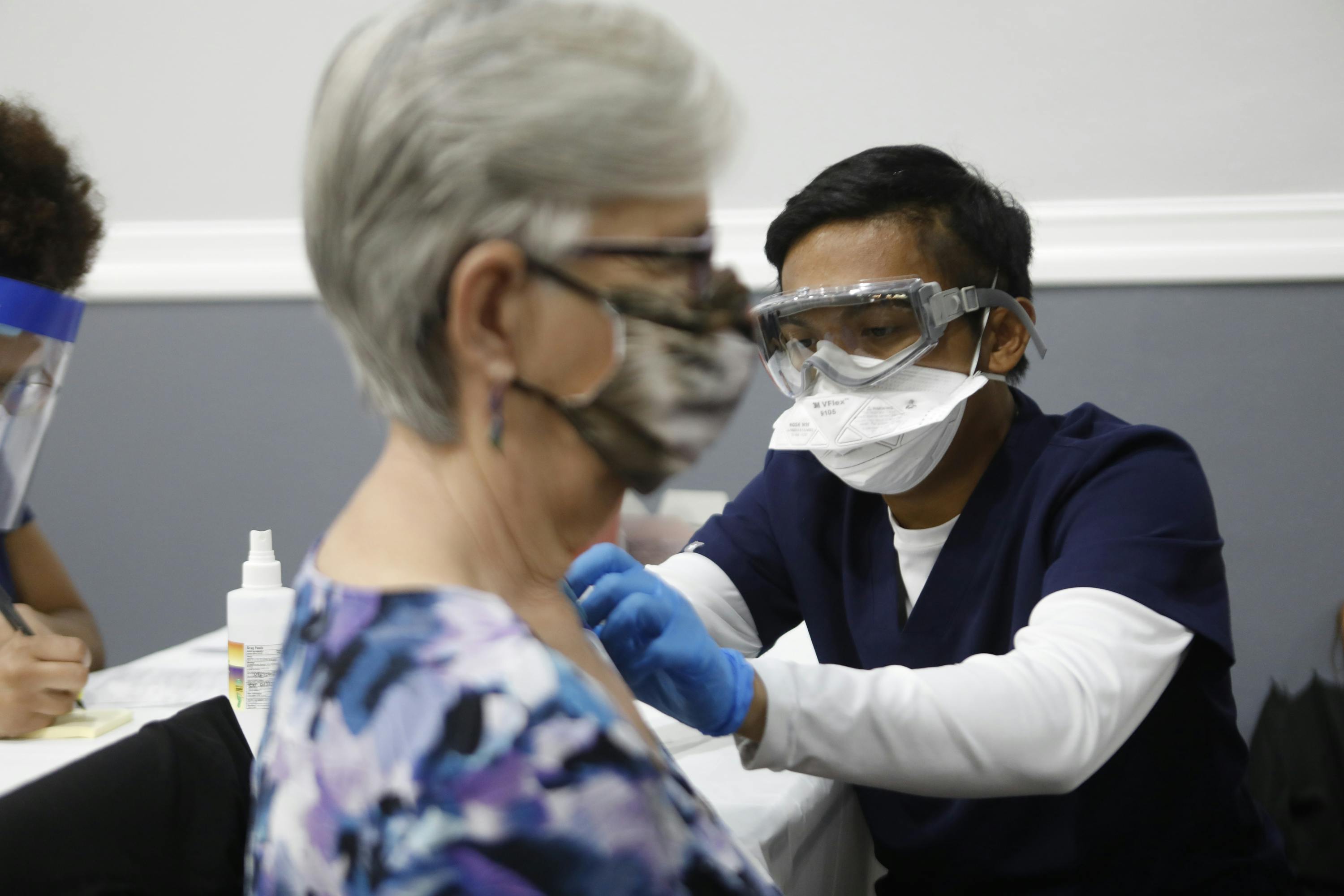 A woman in Florida receives the Covid-19 vaccine.