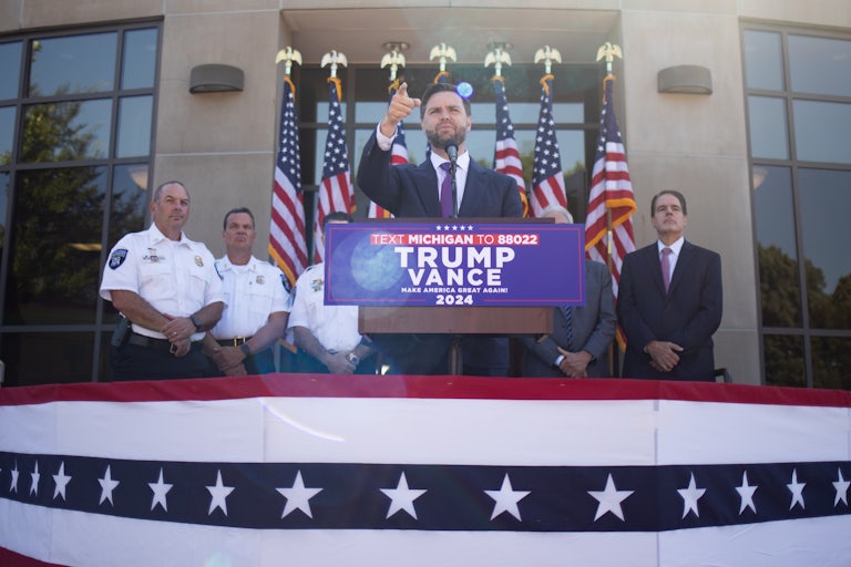 J.D. Vance speaks outside the Shelby Township, Michigan, police department