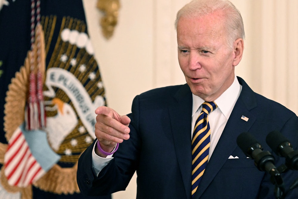President Joe Biden points a finger.