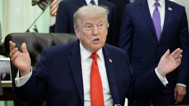 Donald Trump speaks during a proclamation signing ceremony in the Oval Office of the White House.