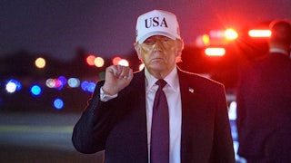 Donald Trump raises a fist while looking VERY old and also like he melted slightly in the tanning bed