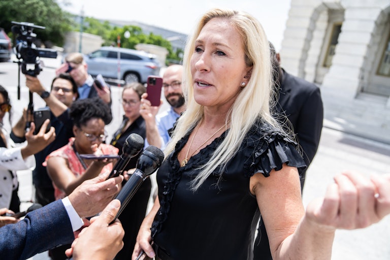 Marjorie Taylor Greene speaks to reporters