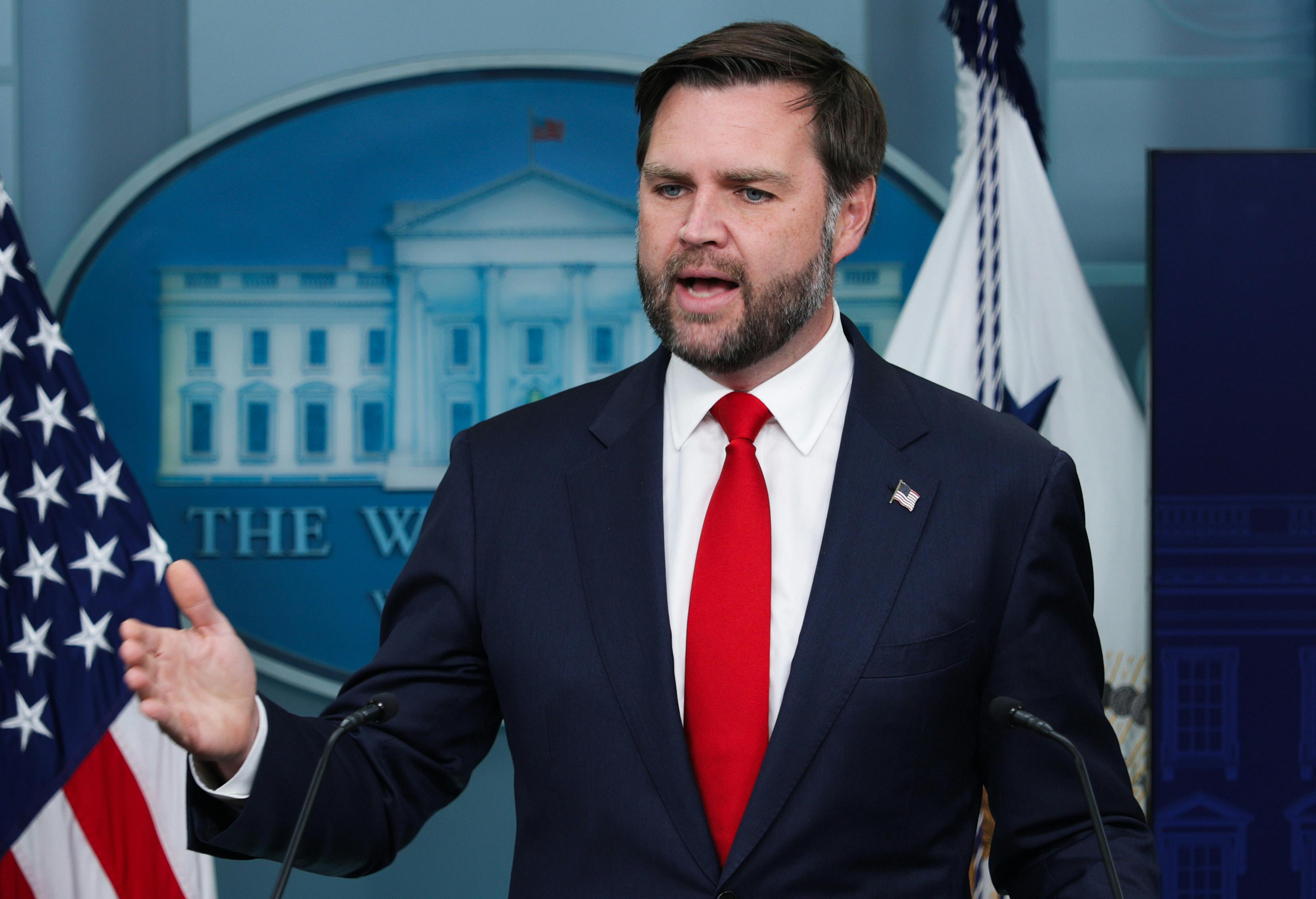 Vice President JD Vance gestures while speaking