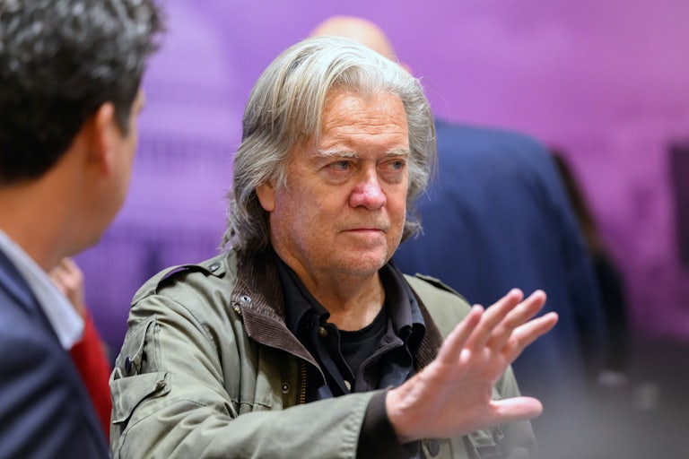 Steven Bannon gestures while speaking
