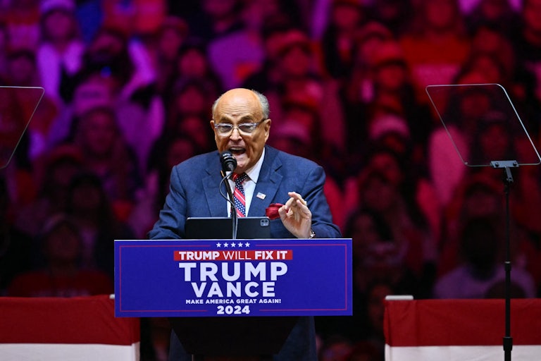 Rudy Giuliani gestures while speaking at a Donald Trump rally