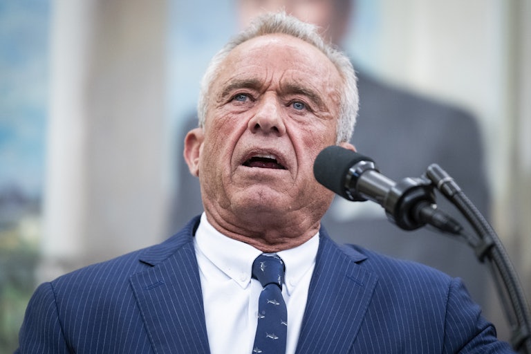 Robert F. Kennedy Jr. speaks into a microphone