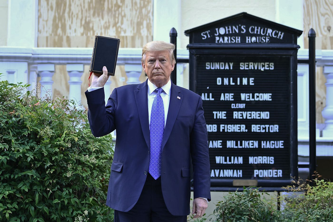 Trump holds up bible