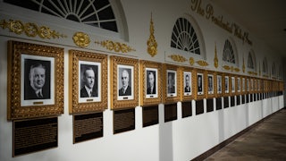 The White House's "Presidential Walk of Fame" with new added plaques under each portrait.