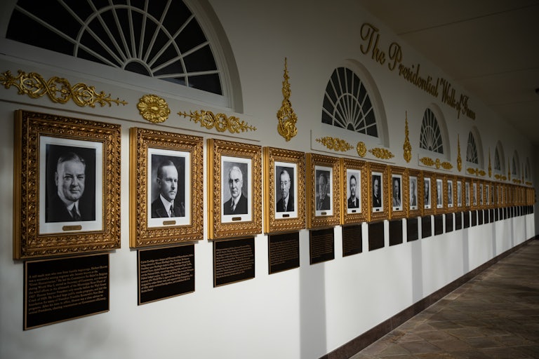 The White House's "Presidential Walk of Fame" with new added plaques under each portrait.