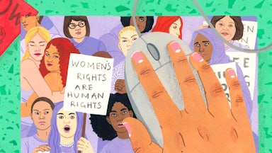 A woman holds a sign saying "women's rights are human rights"