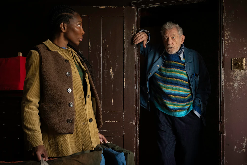 An episodic image of Michaela Coel as Lori Butler and Ian McKellen as Julian Sklar in the film The Christophers.