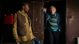 An episodic image of Michaela Coel as Lori Butler and Ian McKellen as Julian Sklar in the film The Christophers.