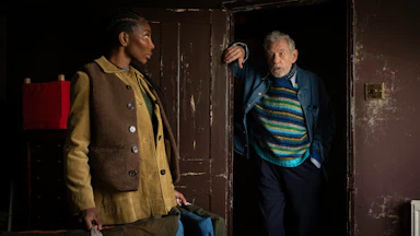 An episodic image of Michaela Coel as Lori Butler and Ian McKellen as Julian Sklar in the film The Christophers.