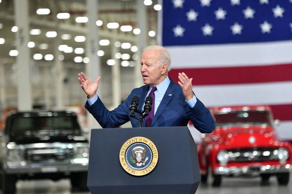Joe Biden speaks at a podium.