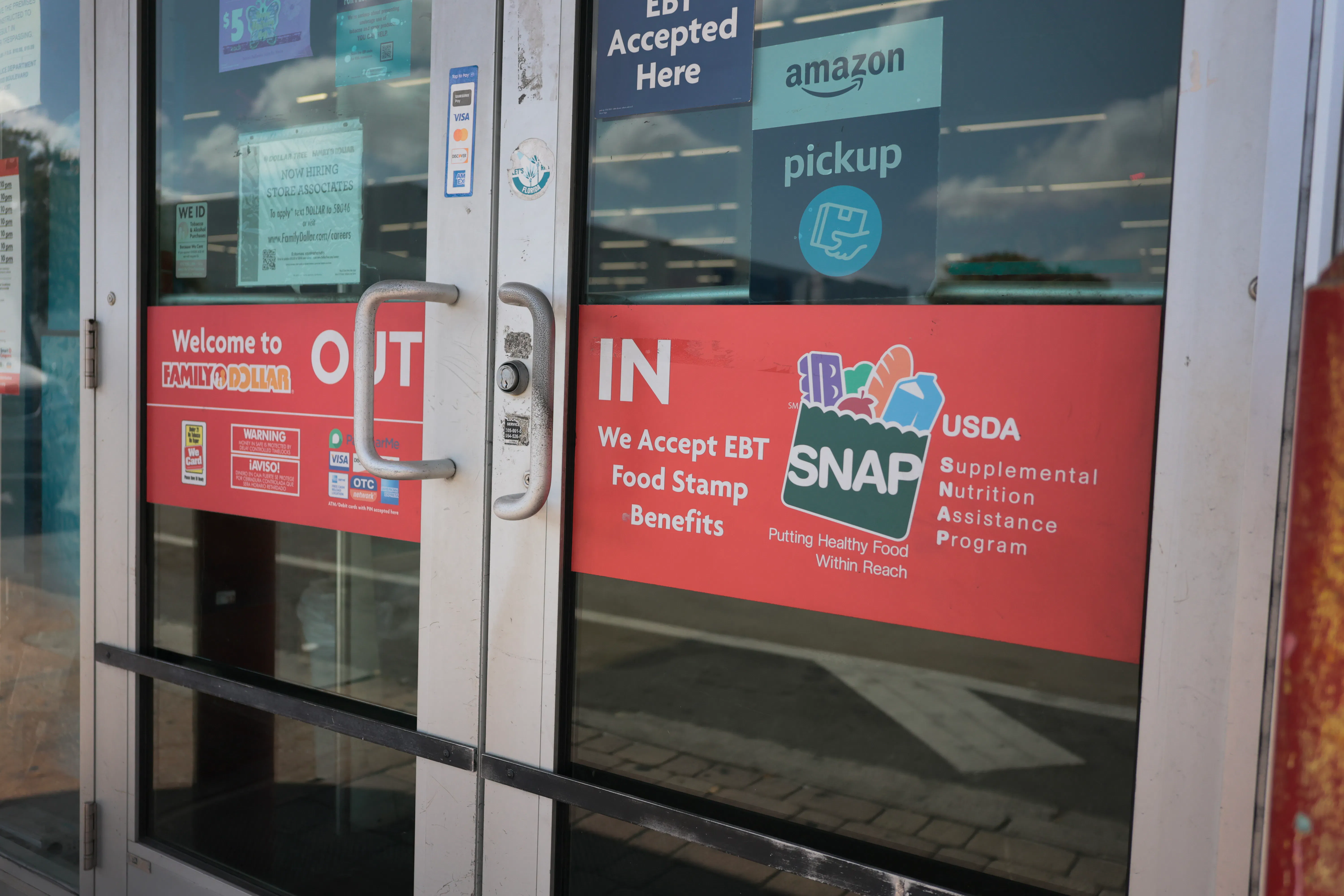A sign indicates the store accepts SNAP benefits on April 21, 2026, in Miami, Florida.