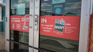 A sign indicates the store accepts SNAP benefits on April 21, 2026, in Miami, Florida.