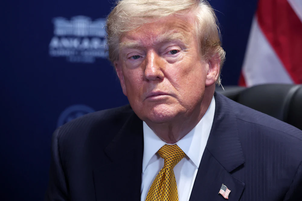 Donald Trump stares listlessly