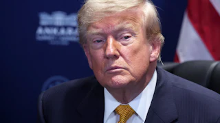 Donald Trump stares listlessly
