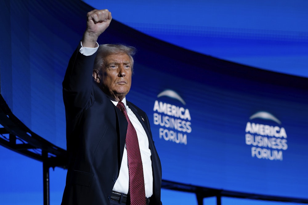 Donald Trump gestures after delivering remarks during the America Business Forum in Miami, Florida.