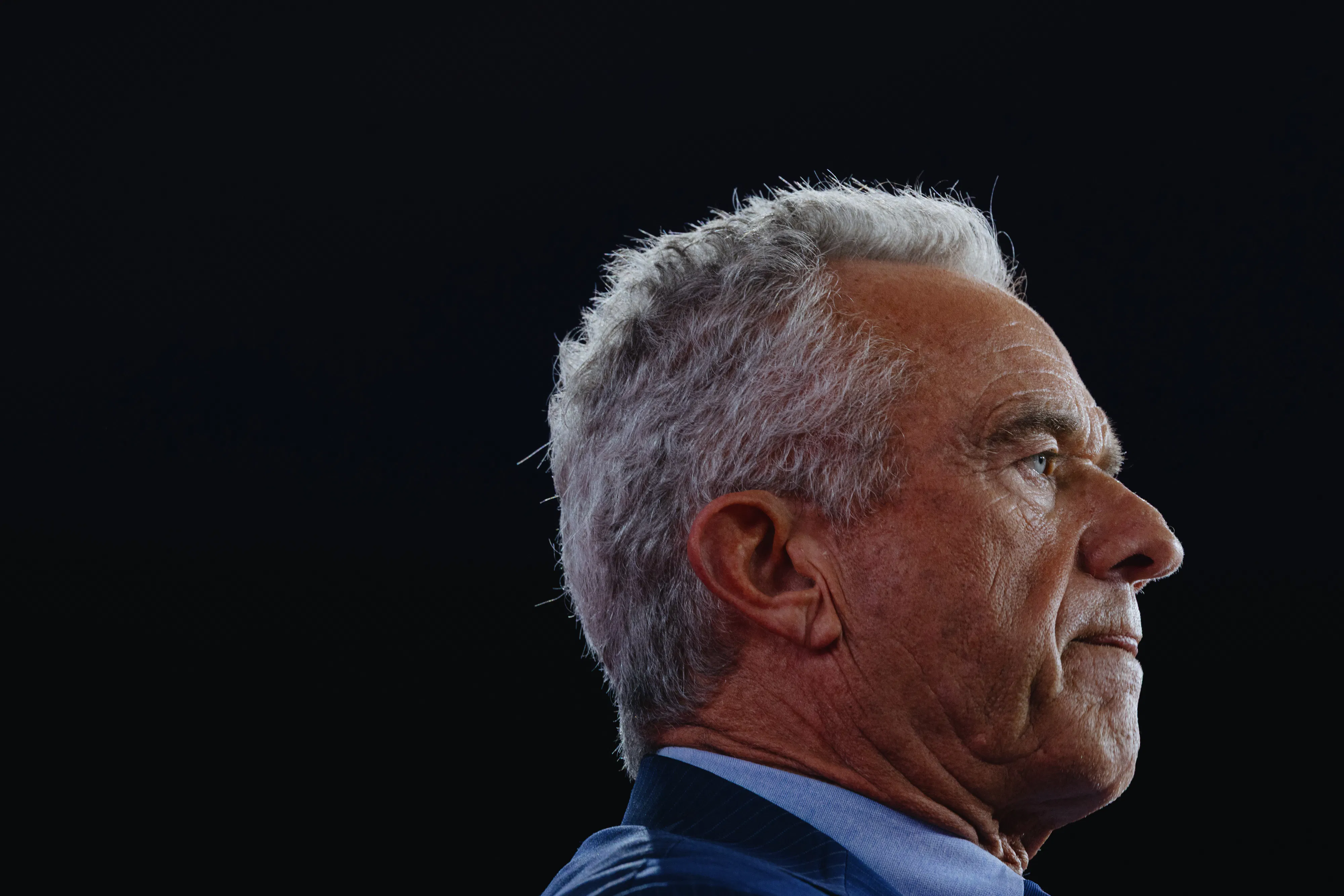 Robert F. Kennedy Jr. stands in profile