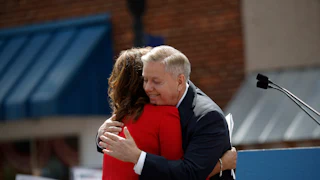 Senator Lindsey Graham hugs his sister Darline Graham Nordone during a campaign stop in 2015.