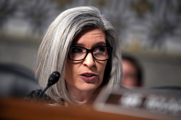 Senator Joni Ernst looks to the side while speaking during a Senate hearing