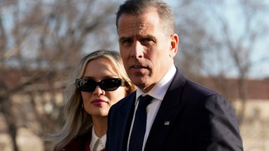 Hunter Biden walks with his wife