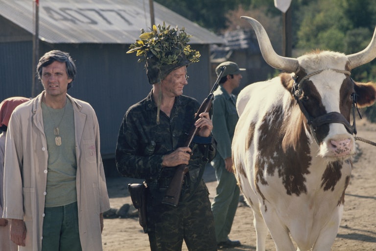 Alan Alda and Larry Linville during the filming of M*A*S*H