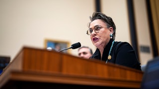 Representative Harriet Hageman speaks at a podium
