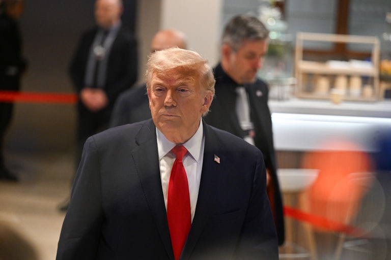 President Donald Trump walks around after his speech at the World Economic Forum in Davos.