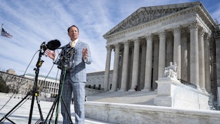 Louisiana Governor Jeff Landry speaks in front of the Supreme Court.