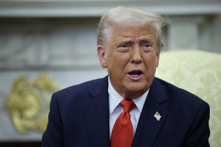 Donald Trump makes a distressed face while speaking in the Oval Office of the White House.