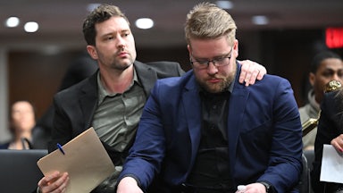 Brent Ganger puts his arm around his brother Luke Ganger after they testified in Congress about the death of their sister Renee Nicole Good