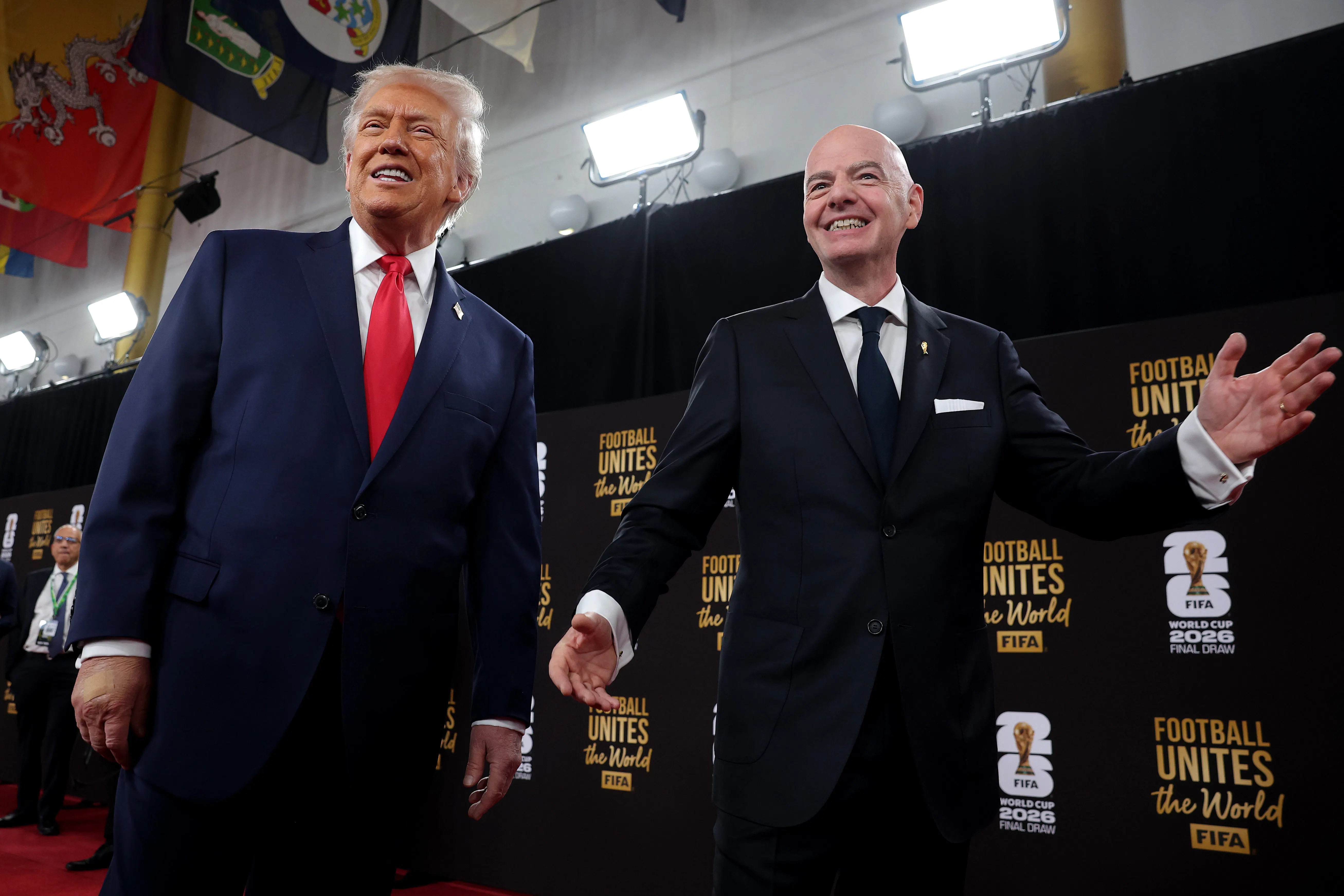 President Donald Trump and FIFA President Gianni Infantino smile for the cameras on the red carpet