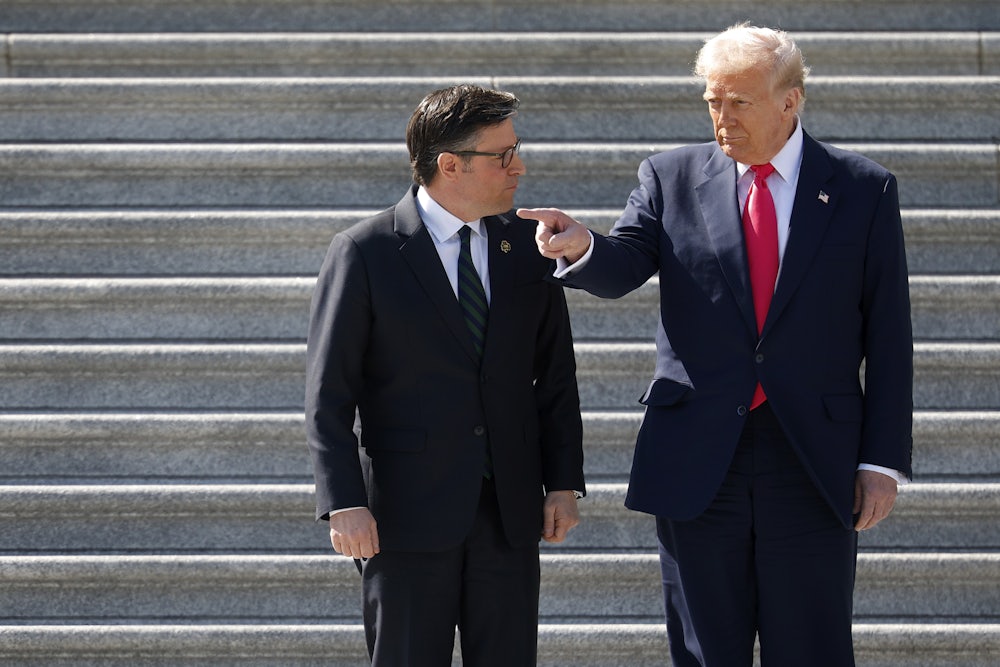 Donald Trump gestures as House Speaker Mike Johnson looks on while departing the U.S. Capitol. Kevin Dietsch/Getty Images
