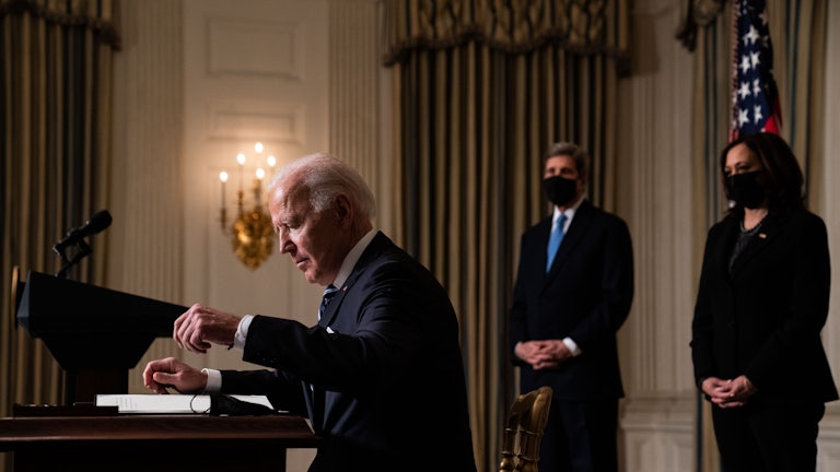 Joe Biden prepares to sign executive orders relating to climate change issues on January 27.