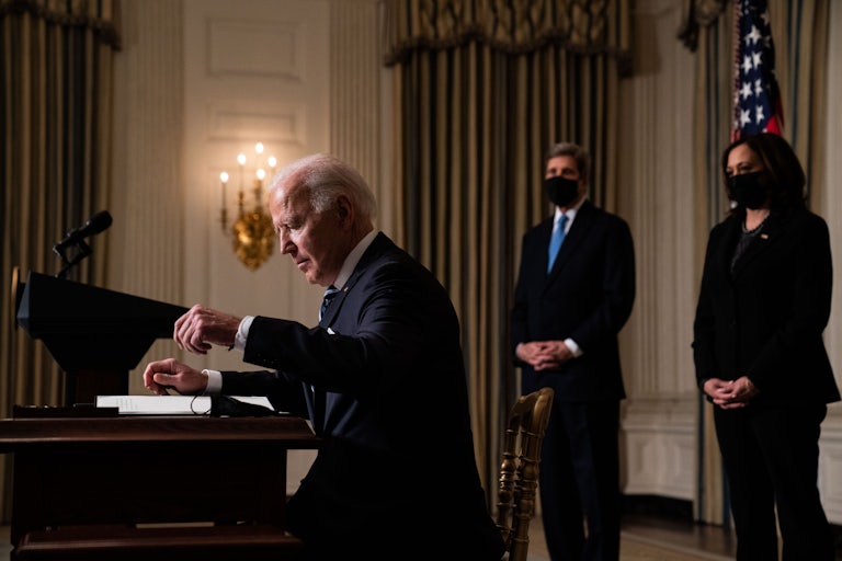 Joe Biden prepares to sign executive orders relating to climate change issues on January 27.