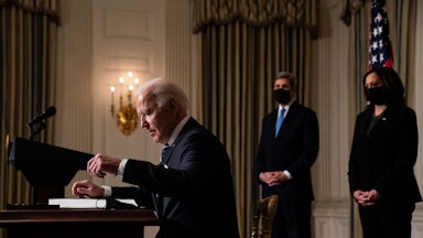 Joe Biden prepares to sign executive orders relating to climate change issues on January 27.