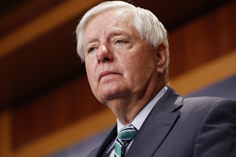 Lindsey Graham looks at reporters